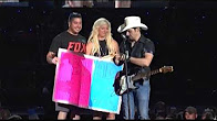 Brad Paisley Reveals Gender of Couple’s Baby on Stage