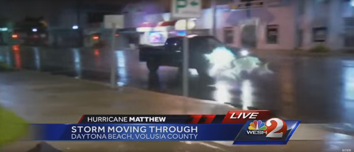 Crazy Driver Does Donuts in Front of News Cameras During Hurricane Matthew