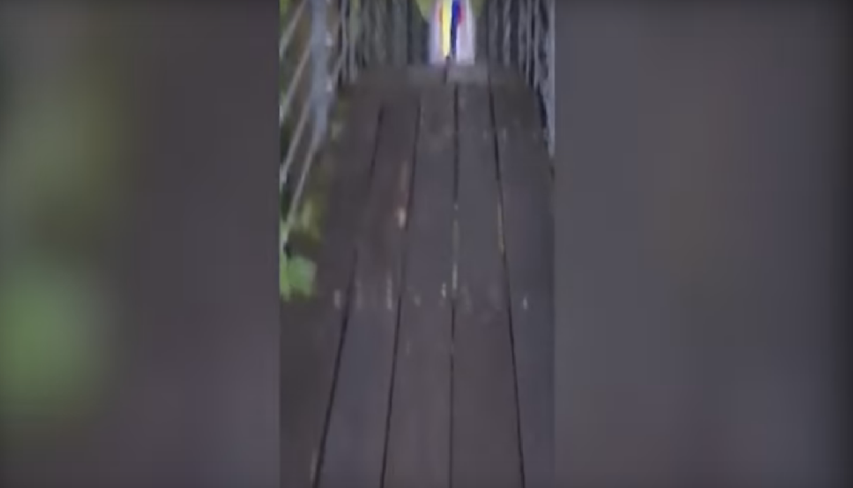 Watch Chilling Footage of a Creepy Clown Chasing Joggers Through the Woods