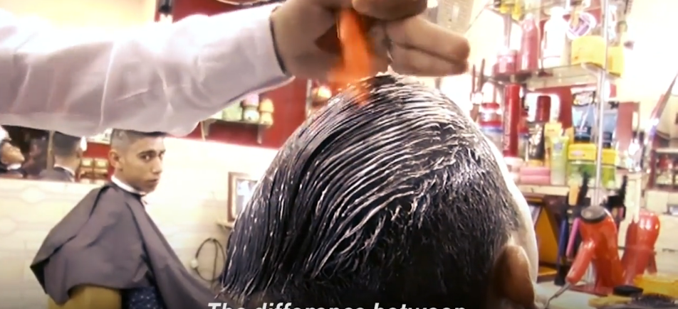 Crazy Barber Uses Fire to Straighten Hair [VIDEO]