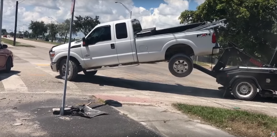 Repossessed Truck Has Tug-Of-War With Tow Truck  [VIDEO]