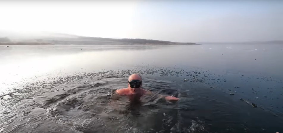 Free Diver Swims Underneath Clear Ice and Makes Us All Shiver [WATCH]