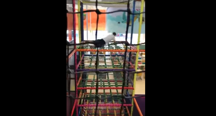 Daring Dad Belly Flops Through Net Trampolines on Indoor Playground [WATCH]