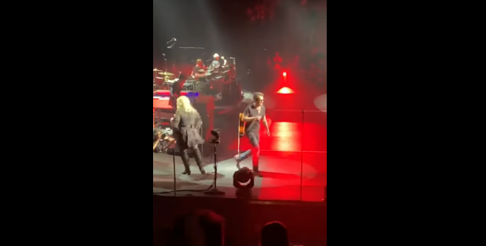 Eric Church Slips on Stage During Desperate Man Performance and Continues to Sing on the Floor [WATCH]