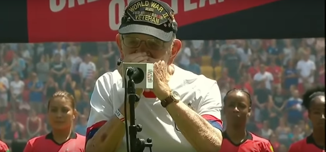 Watch 96-Year Old World War II Veteran Perform National Anthem on Harmonica Before Soccer Match [VIDEO]
